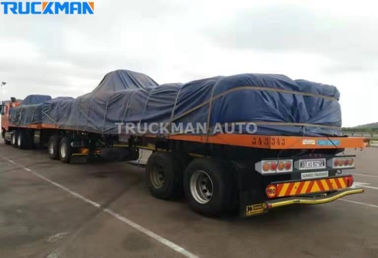Transporte de mercadorias em reboques planos