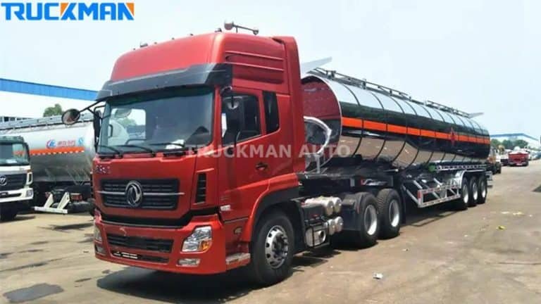 Uma cabeça de trator vermelha a puxar um reboque de camião cisterna TRUCKMAN AUTO, representando a integração de veículos potentes para uma distribuição eficiente de combustível.